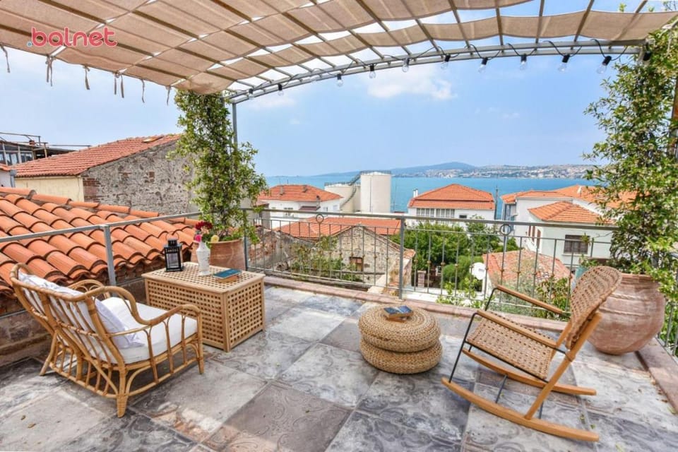 Property building, Patio, Natural landscape, View (from property/room), Balcony/Terrace, Living room, Sea view