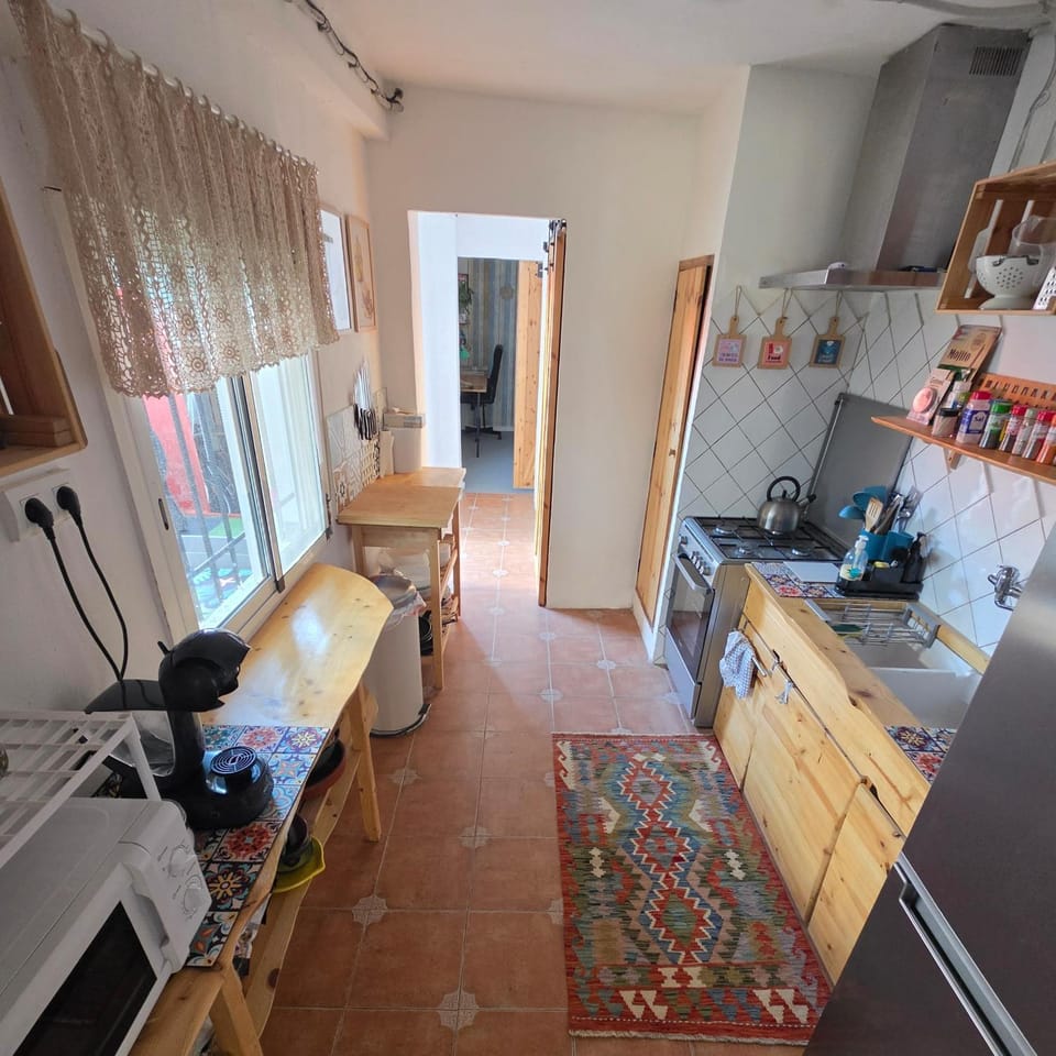 Kitchen or kitchenette, dishwasher, oven, stove, toaster