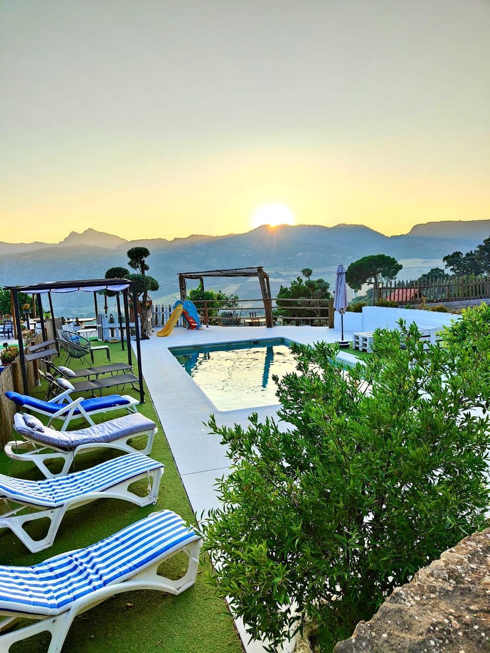 Property building, Day, Natural landscape, Mountain view, Pool view, Swimming pool, sunbed