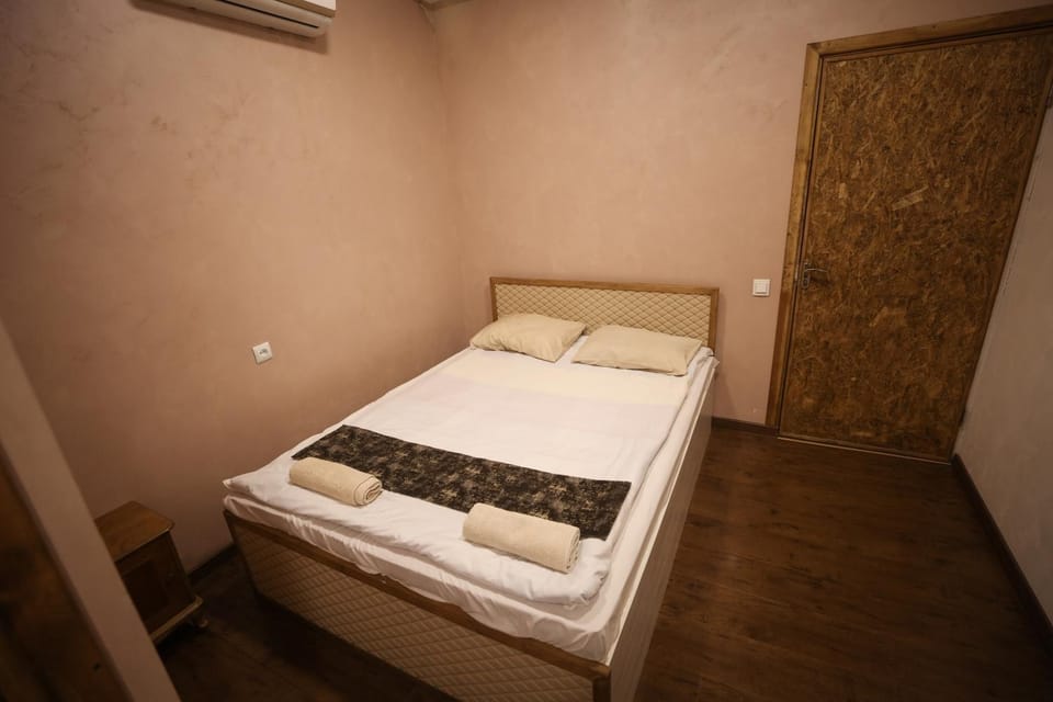 Bed, Photo of the whole room, Bedroom, towels, air conditioner