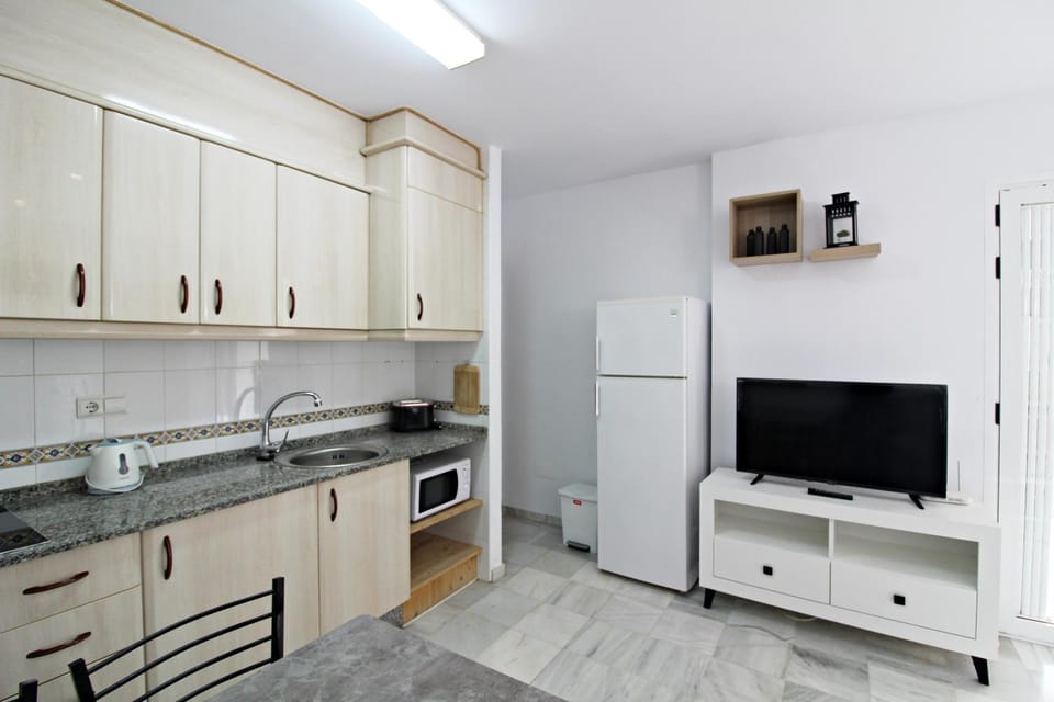 Dining area, minibar, stove, kitchen