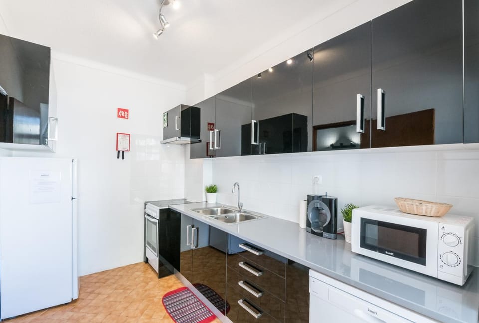 Kitchen or kitchenette, oven, stove, toaster