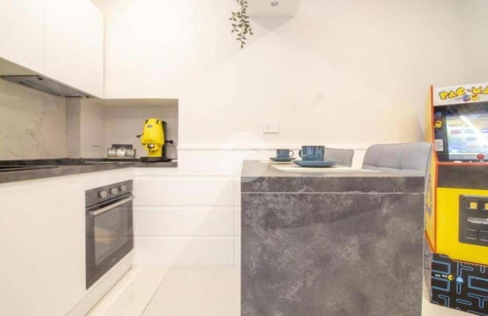 Kitchen or kitchenette, oven