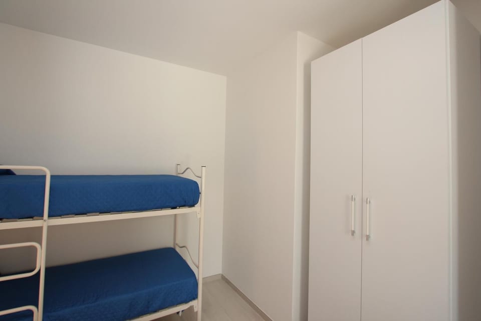 Photo of the whole room, bunk bed, wardrobe