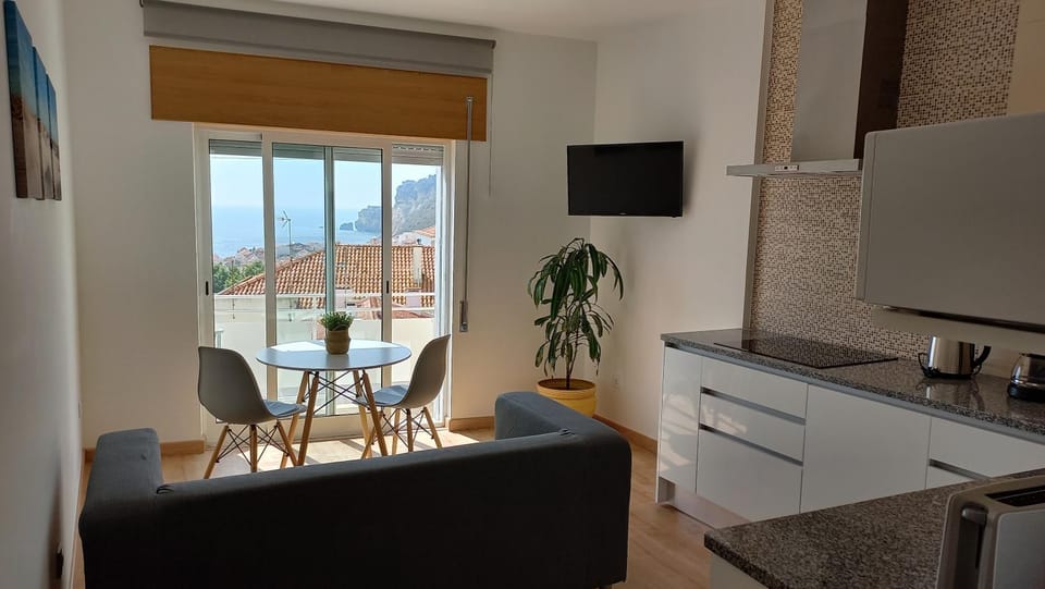 TV and multimedia, View (from property/room), Living room, Seating area, Dining area, City view, Landmark view, Mountain view, Sea view, Street view
