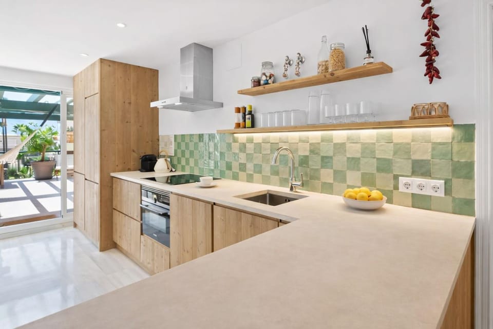 Kitchen or kitchenette, dishwasher, stove, washing machine