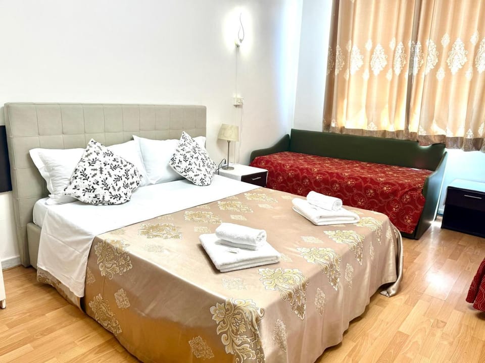 Bed, Living room, Seating area, Bedroom, towels