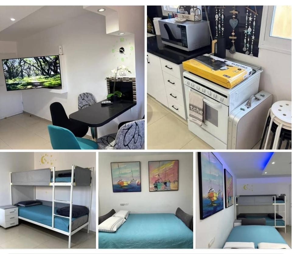 Bed, TV and multimedia, Coffee/tea facilities, Living room, Photo of the whole room, Seating area, bunk bed, furniture, heating, internet, microwave, oven, towels, kitchen, kitchen, air conditioner