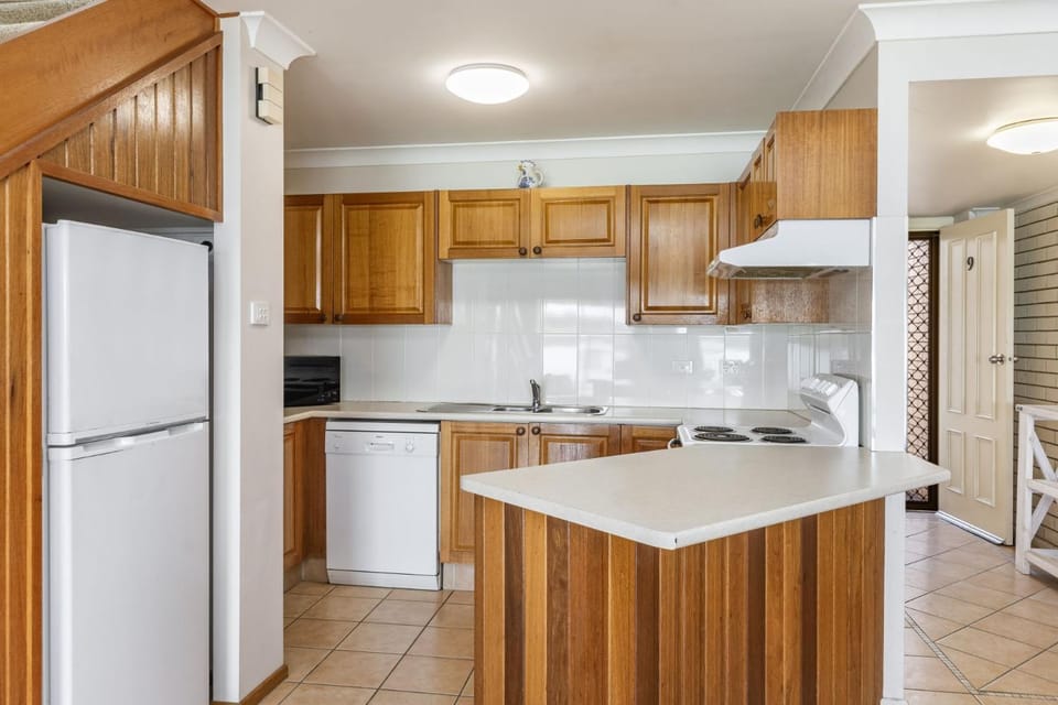 Kitchen or kitchenette, dishwasher, oven, stove, toaster