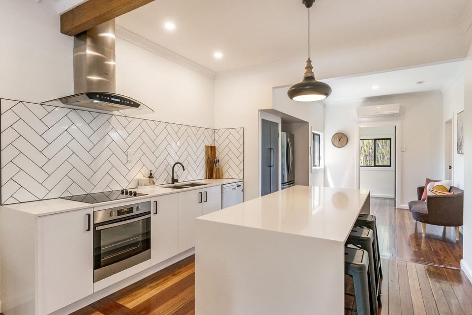 Kitchen or kitchenette, dishwasher, oven, stove, toaster