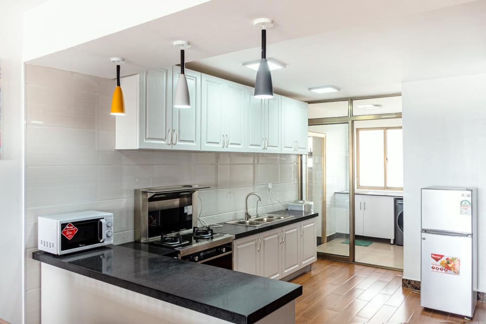 Kitchen or kitchenette, laundry