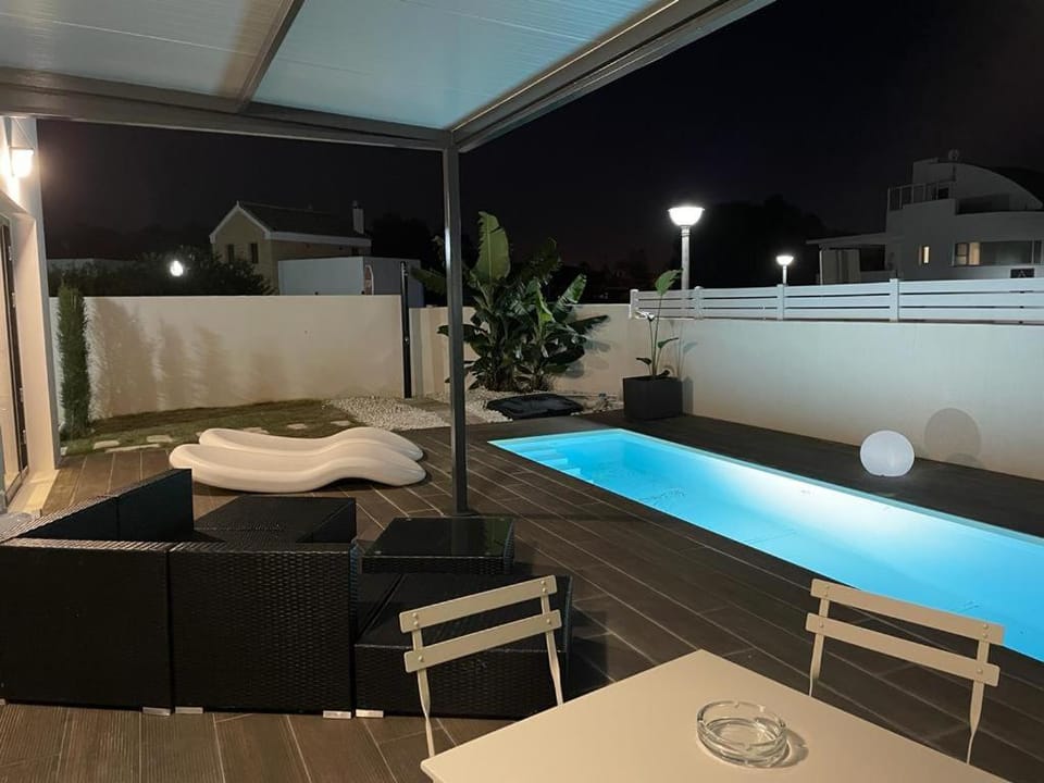 Night, Pool view, Swimming pool, sunbed