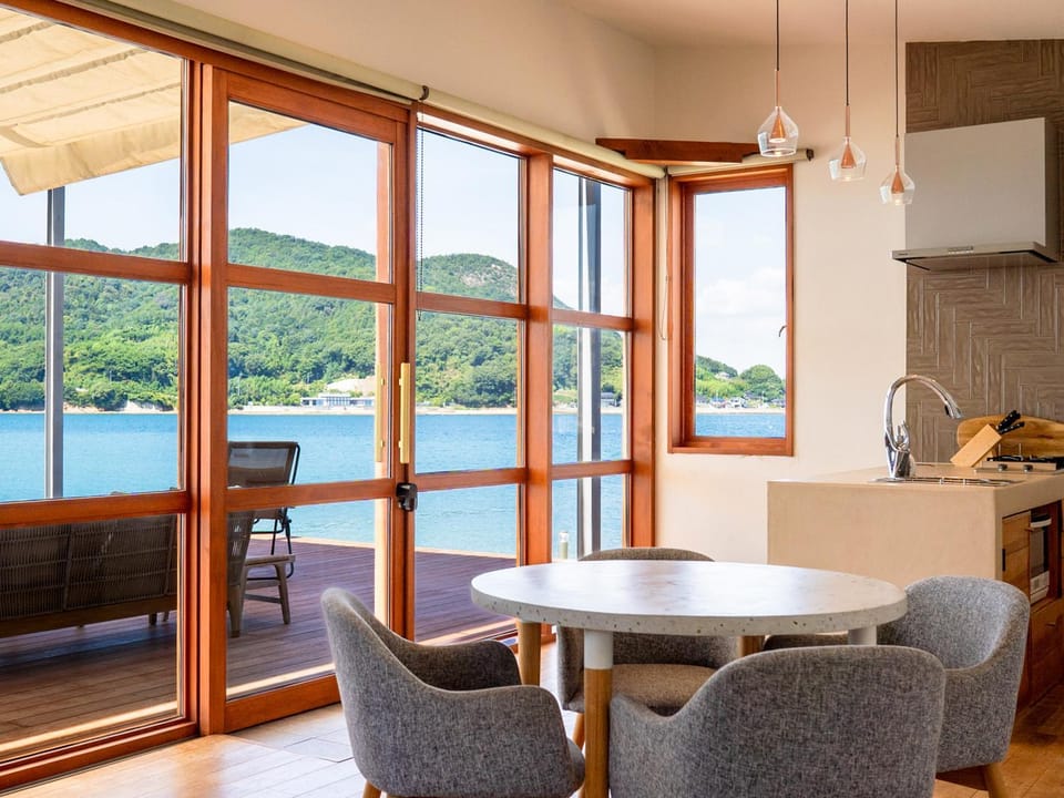 Living room, Dining area, River view