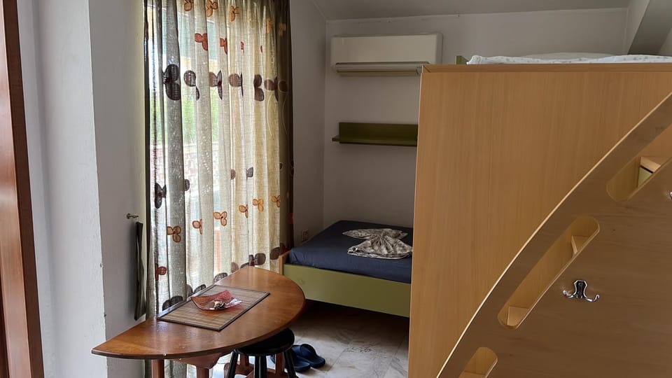 Bed, air conditioner
