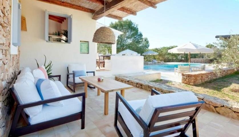 Living room, Seating area, Pool view