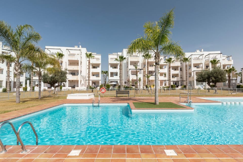 Property building, Living room, Swimming pool