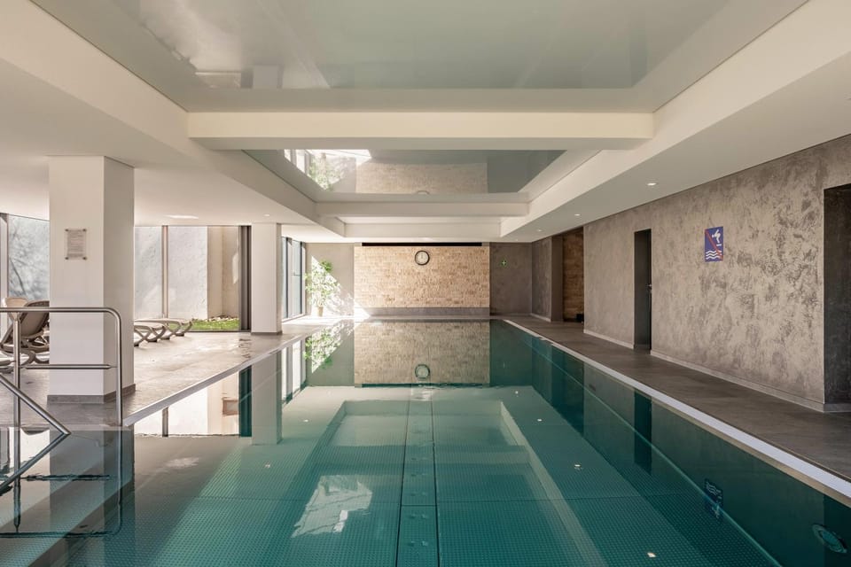 Property building, Living room, Swimming pool