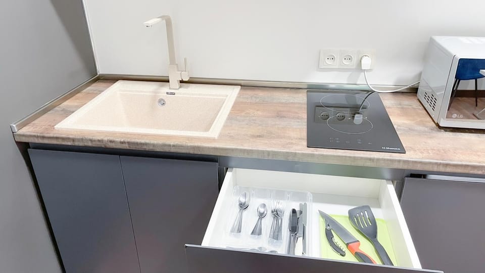 Kitchen or kitchenette, stove