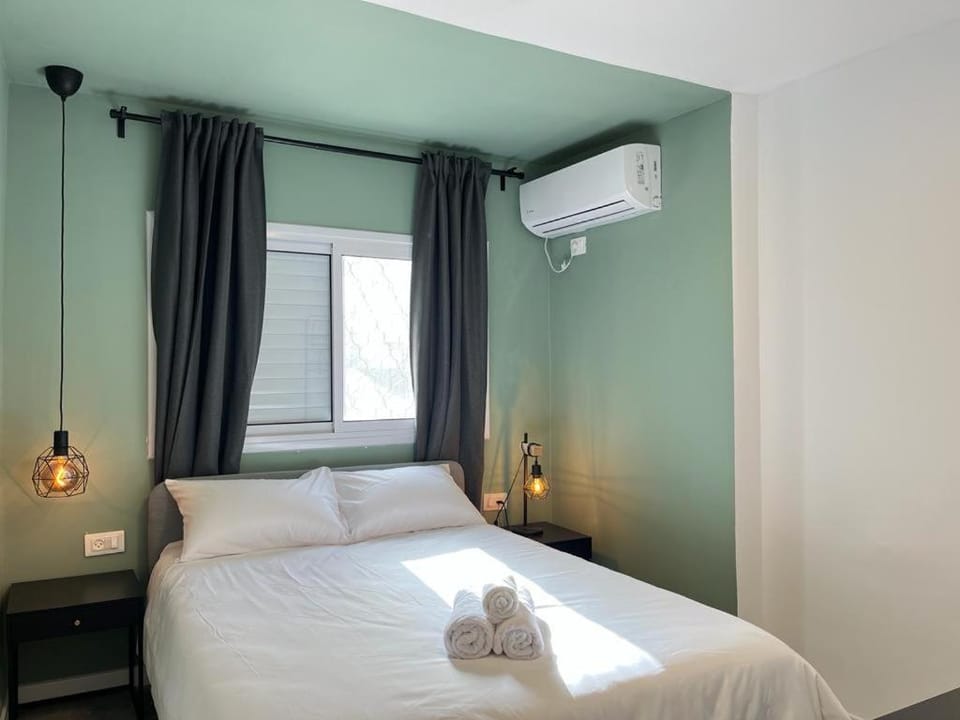 Bed, Photo of the whole room, Bedroom, towels, air conditioner