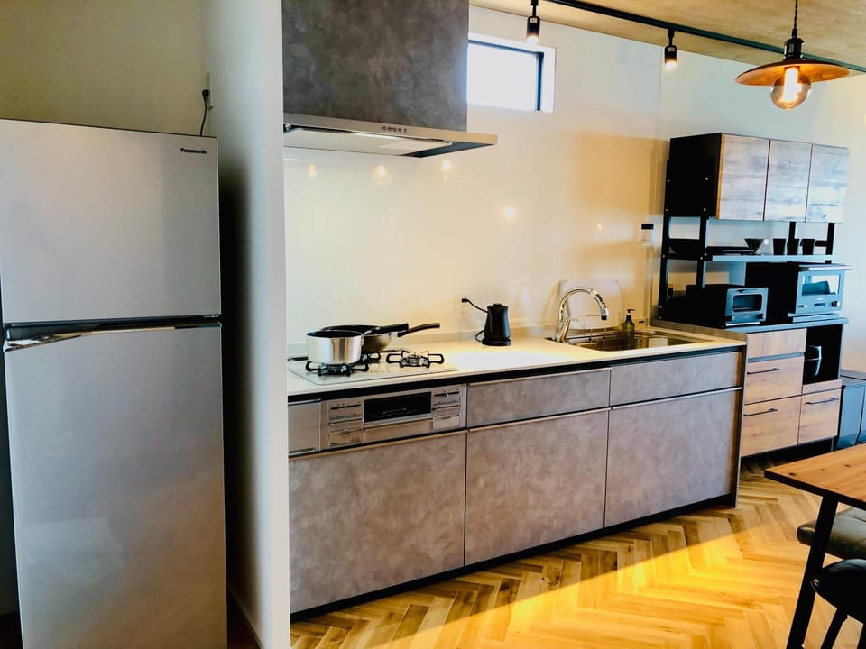 Kitchen or kitchenette, oven, stove, toaster