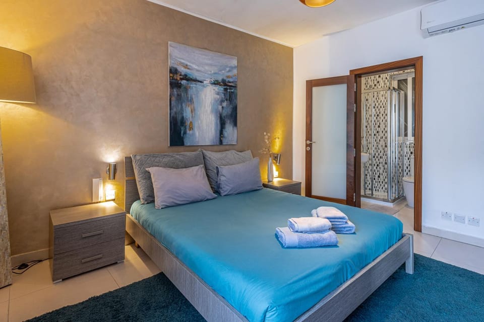 Bedroom, towels, wardrobe, air conditioner