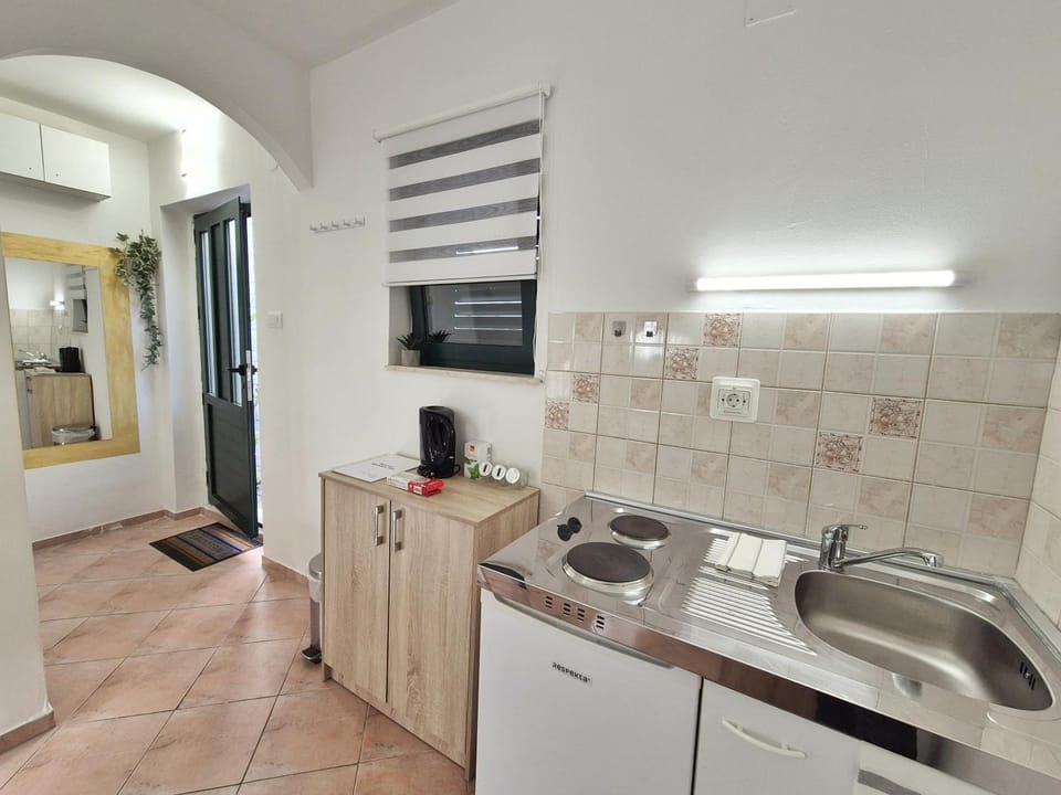 Kitchen or kitchenette, stove