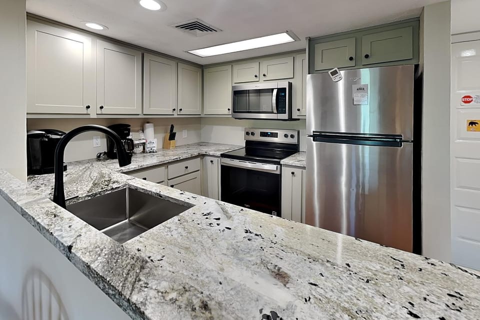 Kitchen or kitchenette, microwave, oven, stove, kitchen