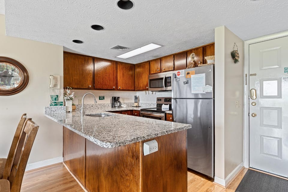 Kitchen or kitchenette, microwave, oven, stove, toaster, kitchen