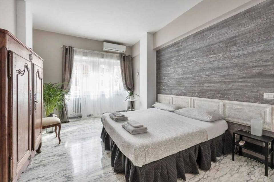 Bed, Photo of the whole room, Bedroom, towels, air conditioner
