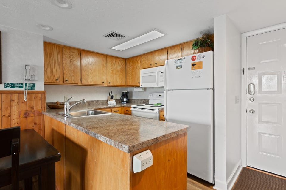 Kitchen or kitchenette, microwave, oven, stove, kitchen