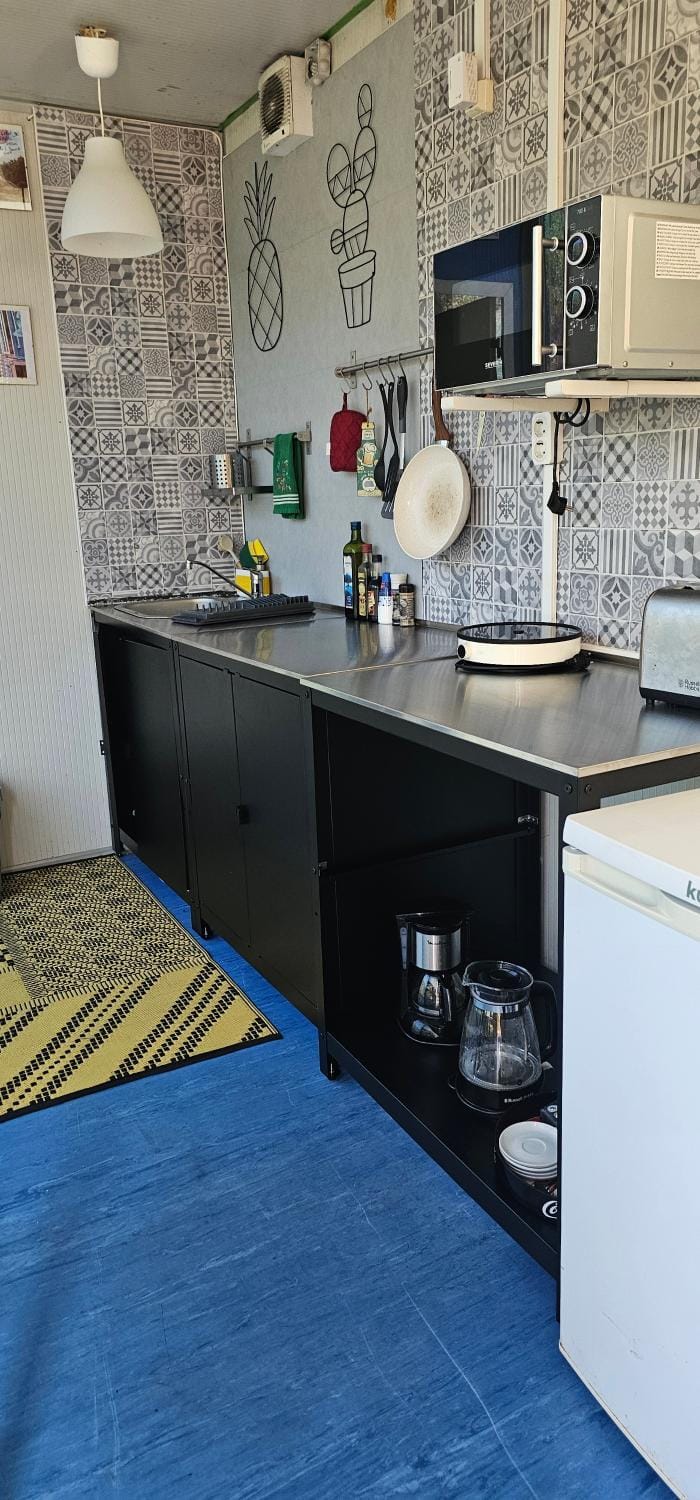 Kitchen or kitchenette, microwave, toaster