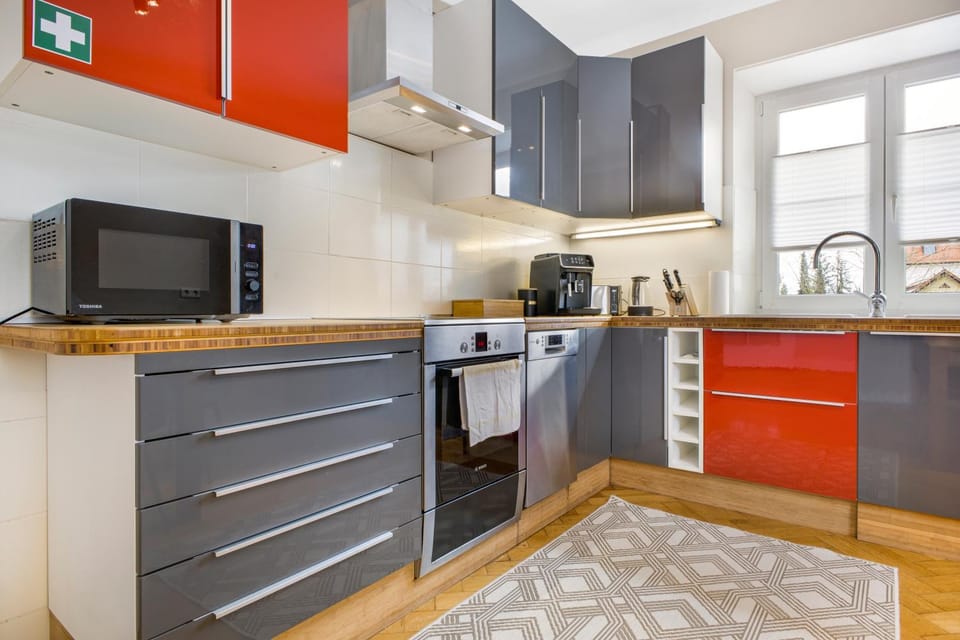 Kitchen or kitchenette, dishwasher, microwave, oven, stove, kitchen