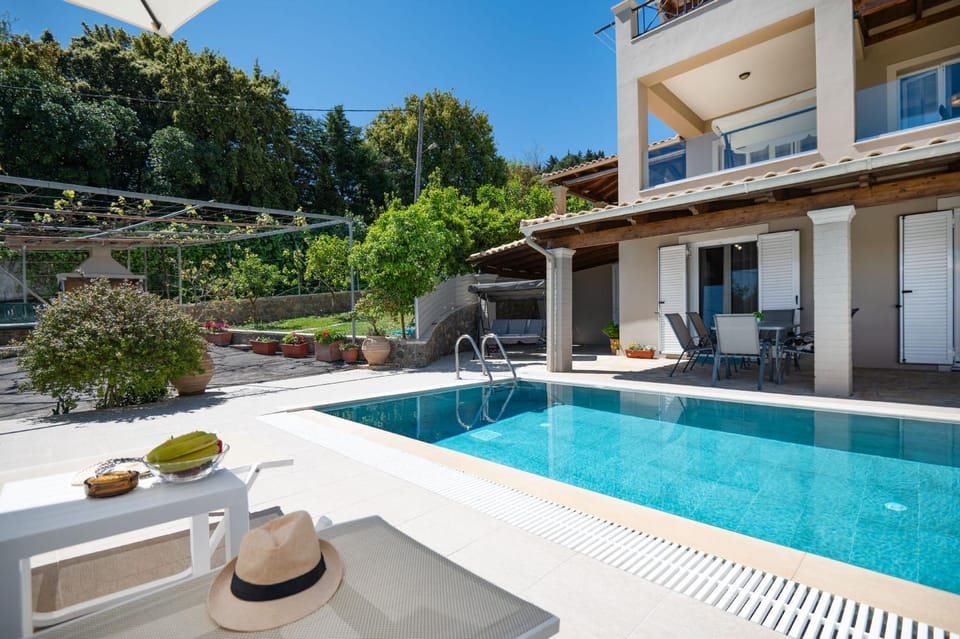 Property building, Patio, Day, Natural landscape, Garden, View (from property/room), Garden view, Pool view, Swimming pool, sunbed