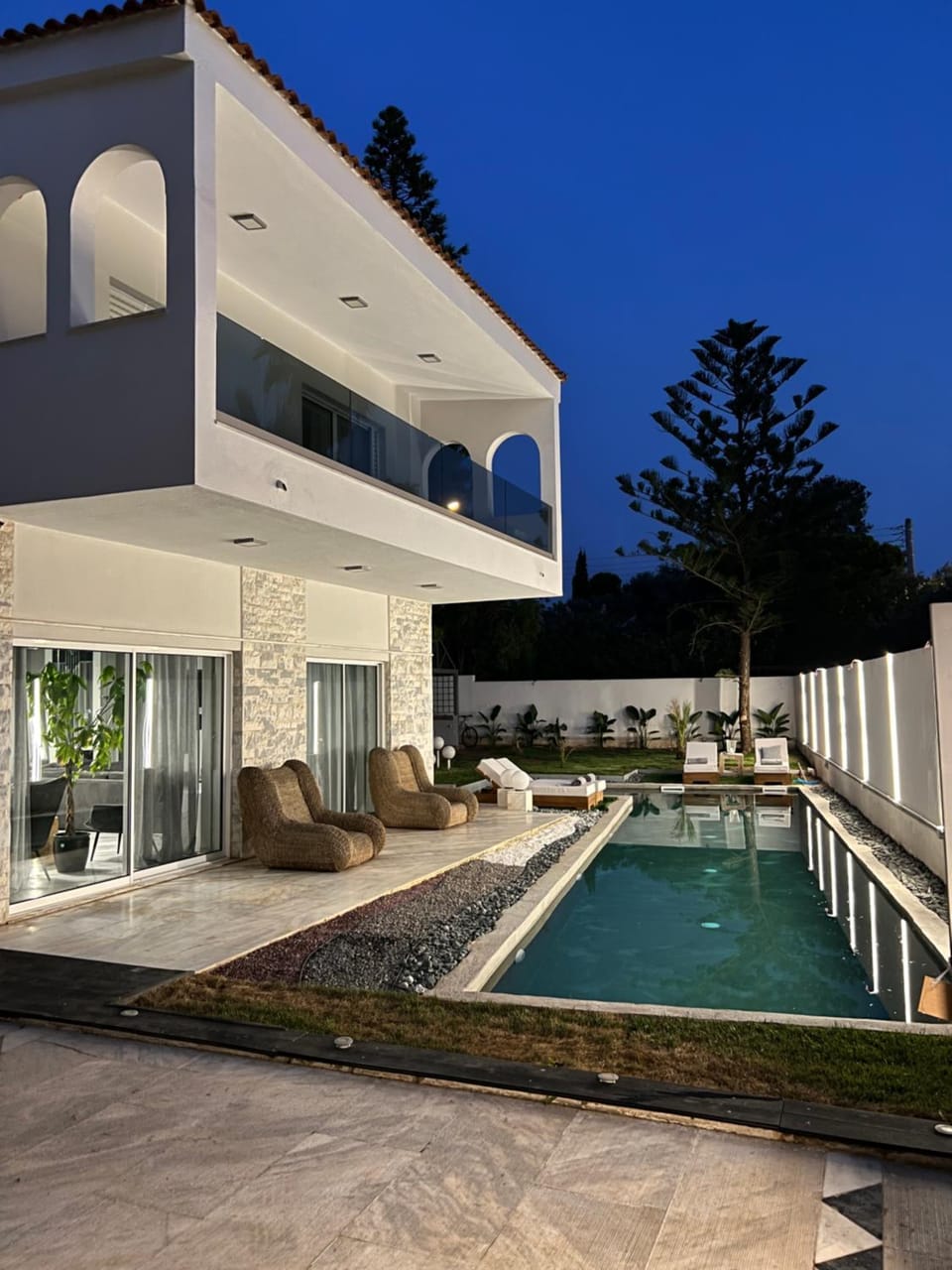 Property building, Patio, Night, Pool view, Swimming pool, sunbed