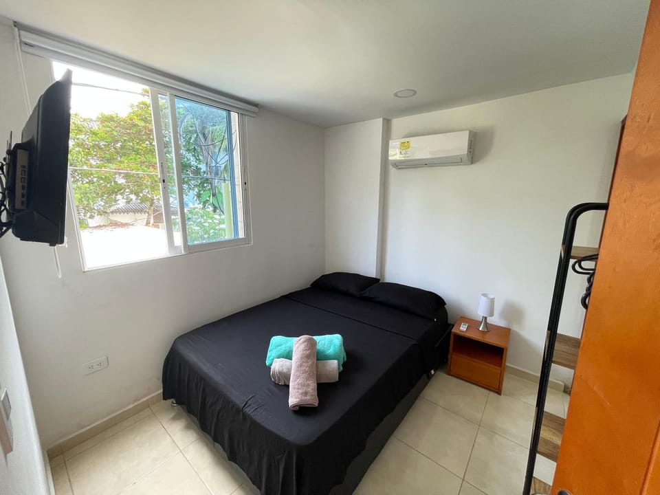 Bed, TV and multimedia, Bedroom, towels, air conditioner