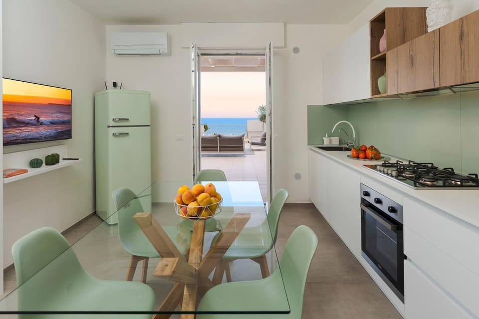 Natural landscape, Kitchen or kitchenette, Living room, Seating area, Dining area, Sea view, oven, stove