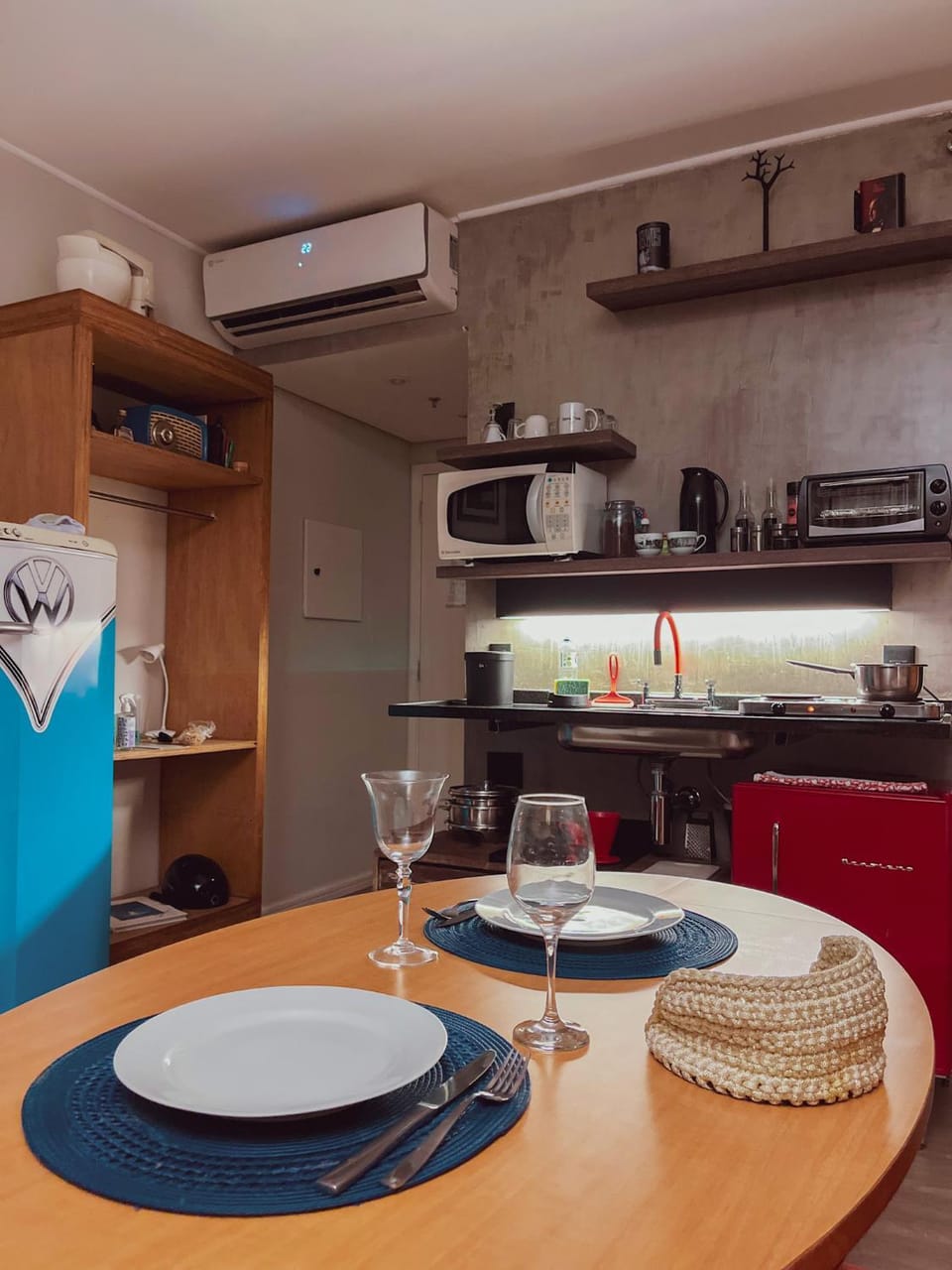 Kitchen or kitchenette, stove, air conditioner
