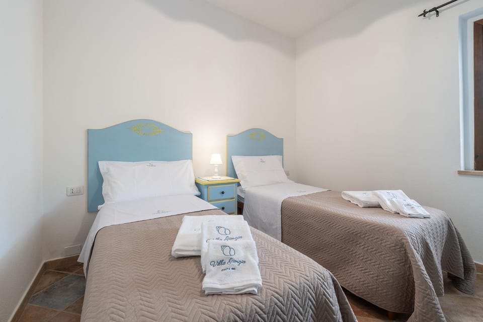 Bed, Photo of the whole room, Bedroom, Inner courtyard view, furniture, furniture, heating, towels, wardrobe, air conditioner