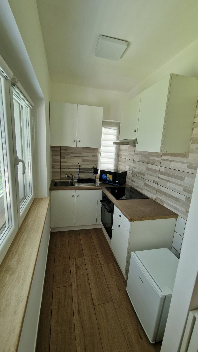 Kitchen or kitchenette, stove