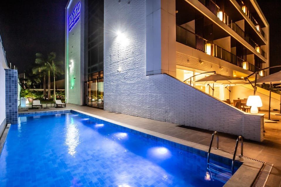 Property building, Night, Pool view, Swimming pool, sunbed