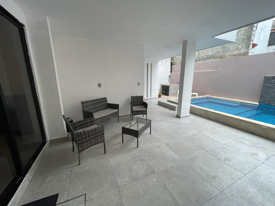 Living room, Seating area, Pool view, Swimming pool
