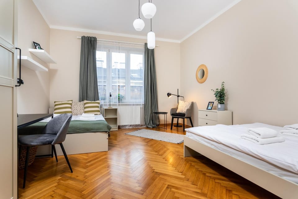 Bed, Photo of the whole room, Seating area, Bedroom, hair dresser, microwave, towels