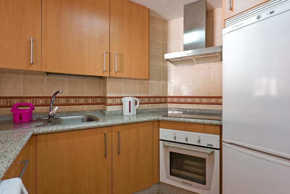 Kitchen or kitchenette, oven, toaster