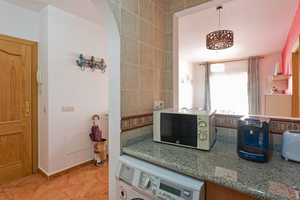 Kitchen or kitchenette, oven, stove, toaster