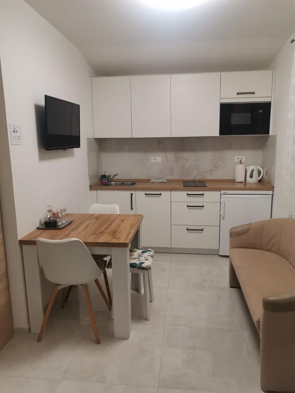 TV and multimedia, Kitchen or kitchenette, Living room, Seating area, Dining area, dishwasher, microwave, stove