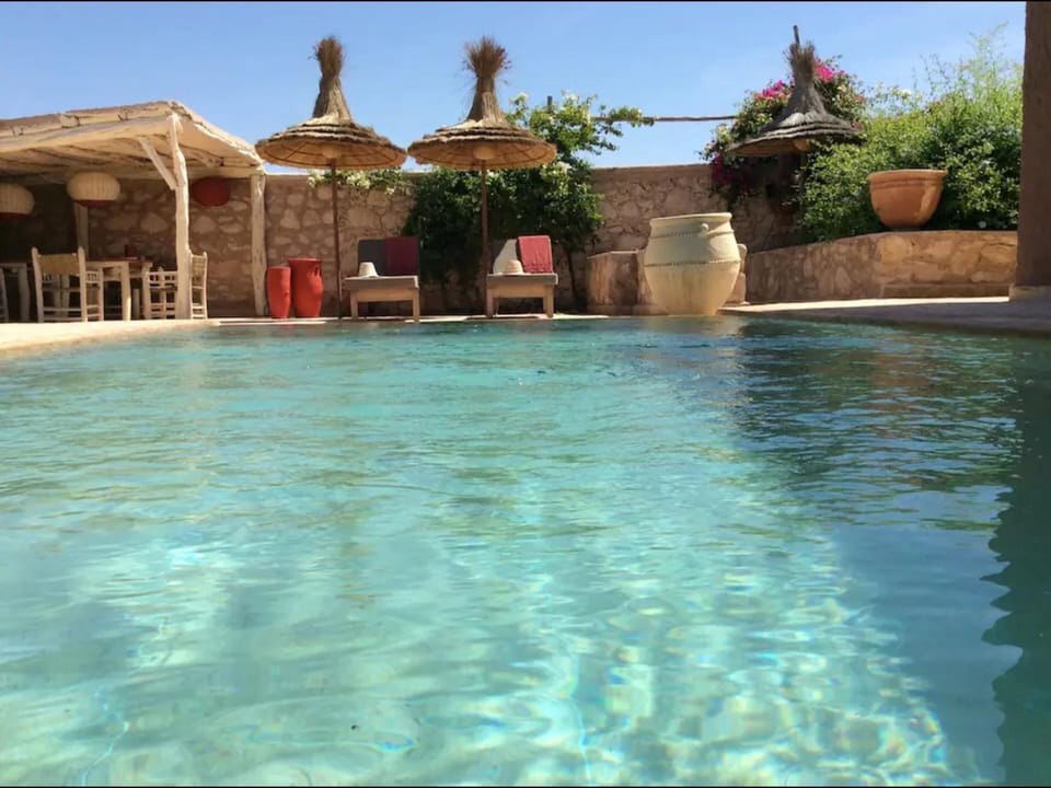 Patio, Day, Pool view, Swimming pool, sunbed