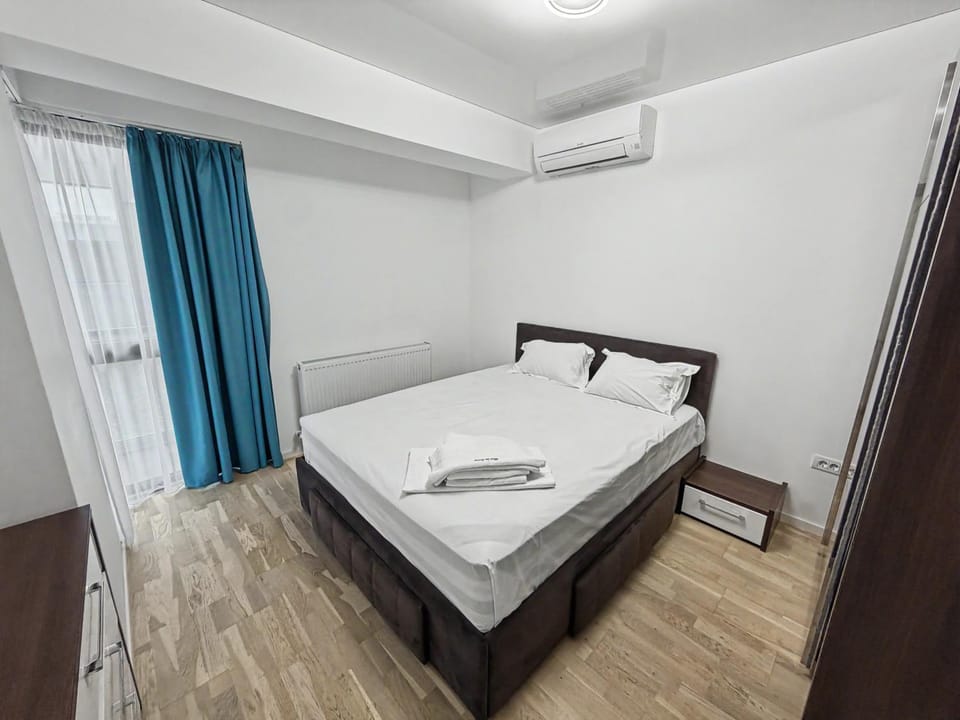 Bed, Photo of the whole room, Bedroom, towels, air conditioner