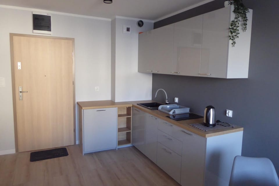 Dziwnówek Słoneczne Tarasy Gray Apartment in West Pomeranian Voivodeship, Poland