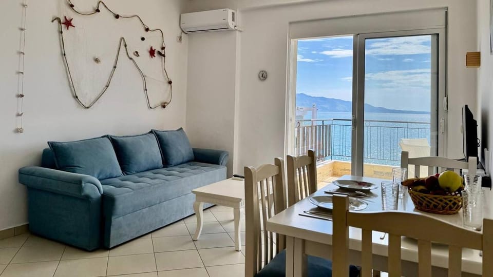 View (from property/room), Balcony/Terrace, Living room, Seating area, Dining area, Mountain view, Sea view