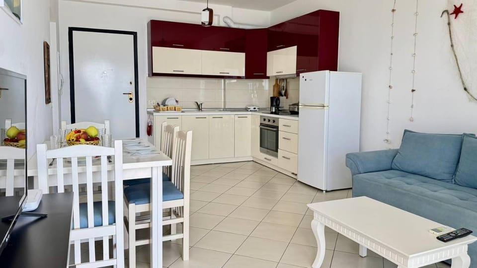 Kitchen or kitchenette, Living room, Seating area, Dining area, oven, stove, toaster